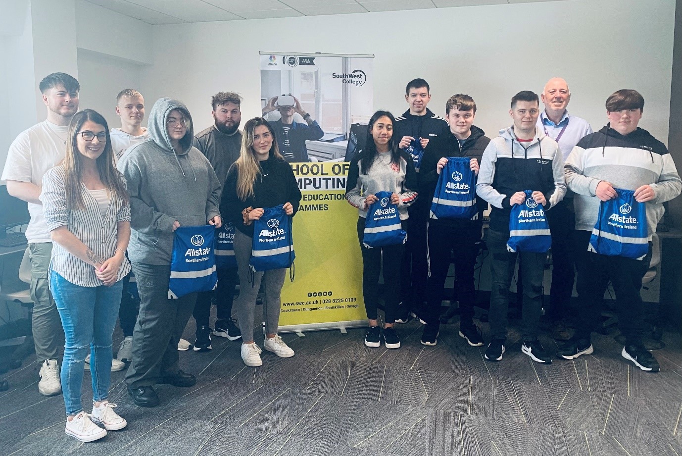 South West College, Level 3 Extended Diploma in IT students celebrating the completion of their project based learning module alongside Aine Mc Namee, Allstate.