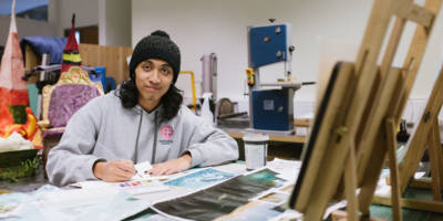 Student working in college art studio