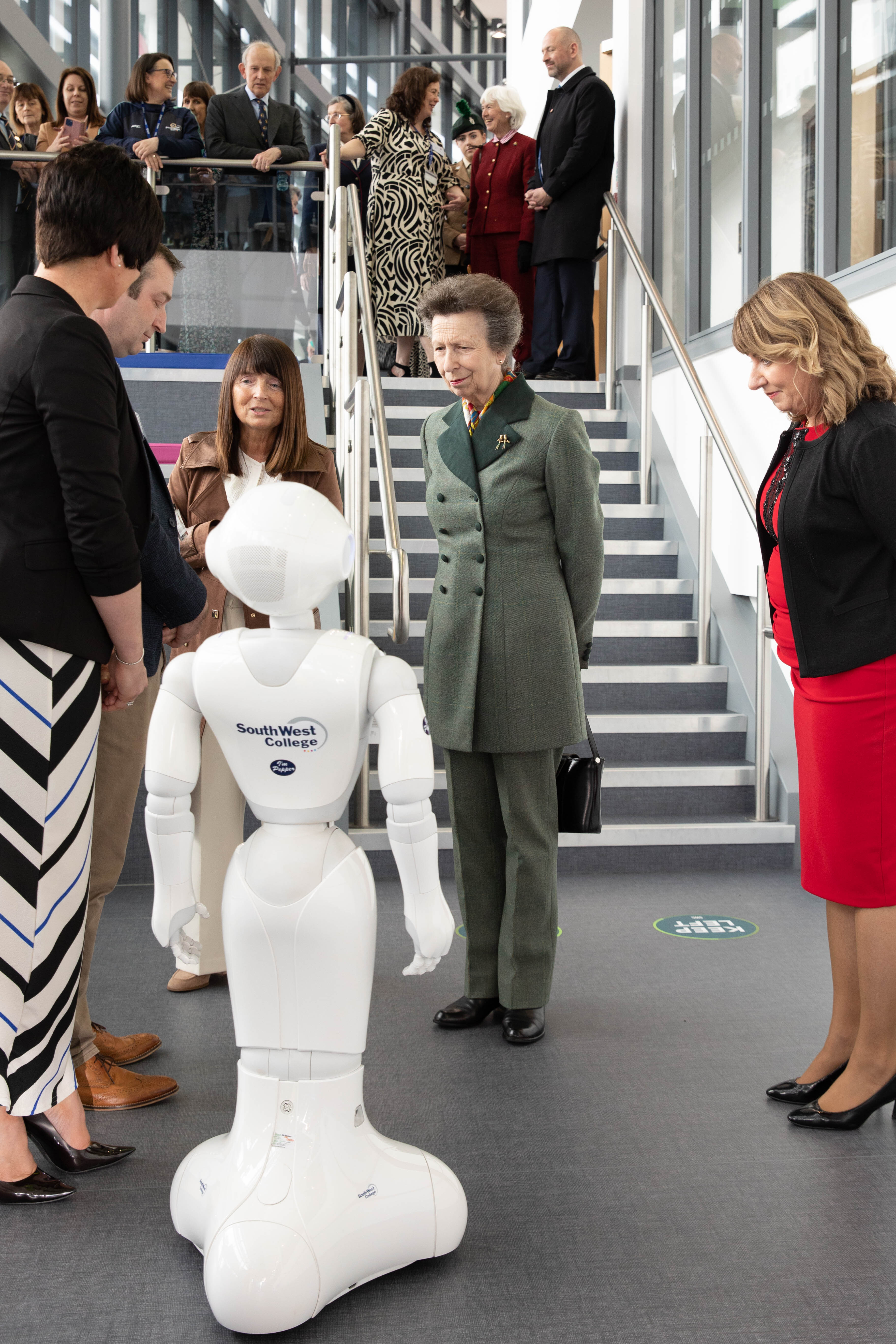 Her Royal Highness, The Princess Royal is introduced to Pepper the Robot by representatives from the Engineering, IT and Creative Industries Department